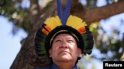FILE PHOTO: Davi Kopenawa, 66, chief of the Yanomami people poses for a picture in Brasilia, Brazil, August 25, 2021.