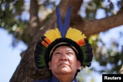 FILE - Davi Kopenawa, 66, chief of the Yanomami people poses for a picture in Brasilia, Brazil, August 25, 2021.