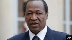 L'ancien président du Burkina Faso Blaise Compaoré à Paris avec François Hollande, le 18 septembre 2012.