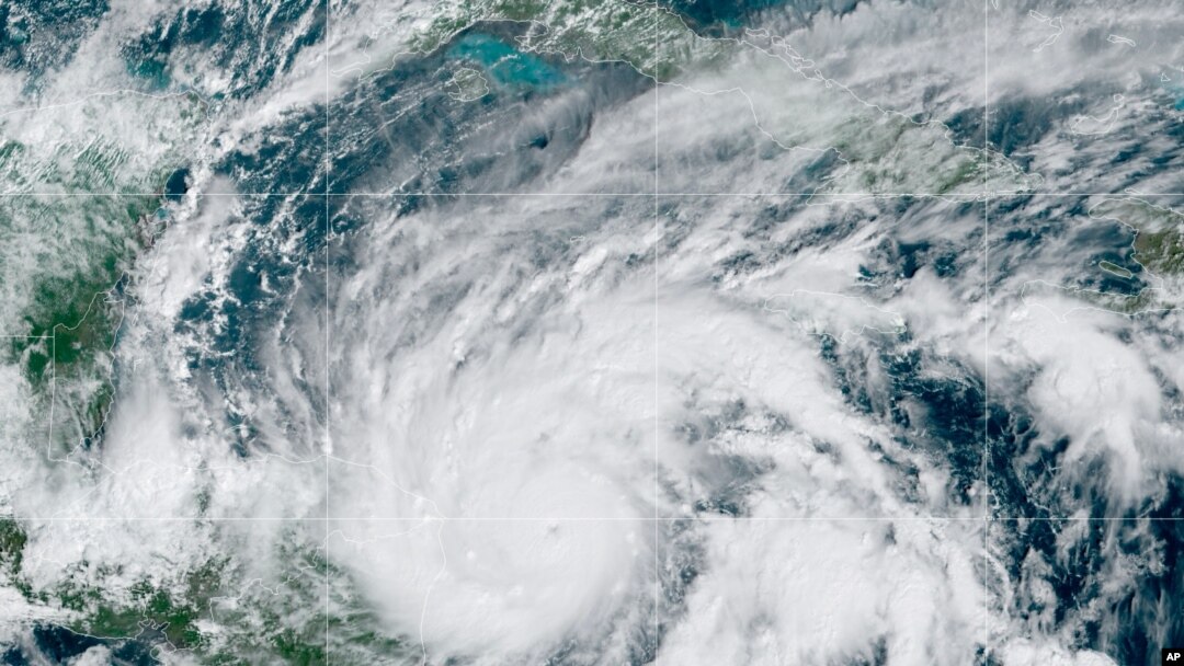 This GeoColor satellite image taken Monday, Nov. 2, 2020, at 1 p.m. EDT, and provided by NOAA, shows Hurricane Eta in the Gulf of Mexico approaching the border of Honduras and Nicaragua. 