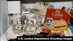 Photo of money government said it found in food boxes in freezer of former Congressman William Jefferson.