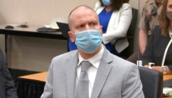 In this image taken from video, former Minneapolis police Officer Derek Chauvin listens as Hennepin County Judge Peter Cahill sentences him to 22 1/2 years in prison, June 25, 2021.