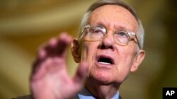 FILE - Senate Minority Leader Harry Reid of Nevada speaks during a news conference on Capitol Hill in Washington, Sept. 16, 2015.