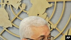 Palestinian President Mahmoud Abbas arrives for a meeting with United Nations Secretary-General Ban Ki-moon at UN headquarters, Sept. 19, 2011