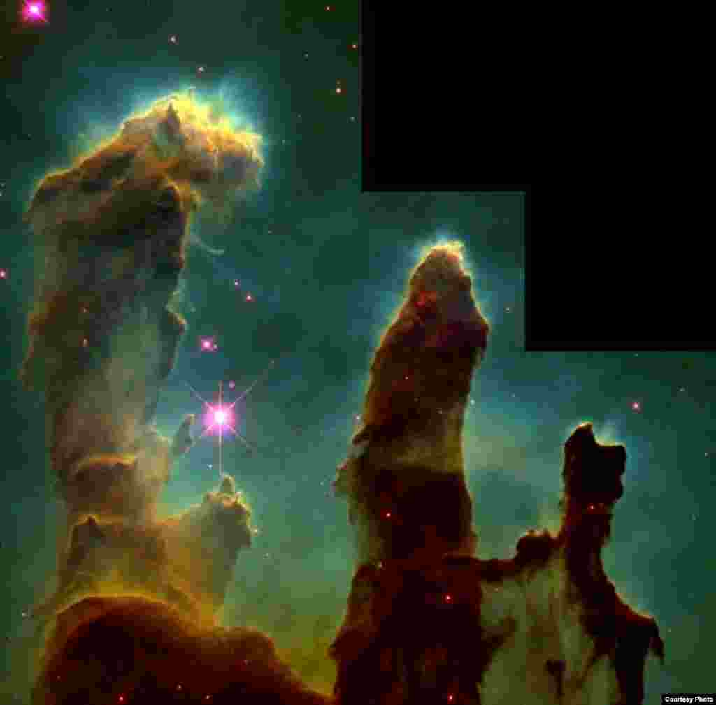 These eerie, dark pillar-like structures are actually columns of cool interstellar hydrogen gas and dust that are also incubators for new stars. (NASA)