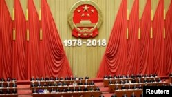 Célébration du 40e anniversaire de la réforme et de l'ouverture de la Chine, au Grand Palais du Peuple à Pékin, en Chine, le 18 décembre 2018. REUTERS