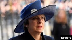 Britain's Prime Minister Theresa May arrives for a Commonwealth Day service at Westminster Abbey in London, Britain, March 13, 2017.