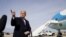 U.S. President Donald Trump talks to reporters prior to boarding Air Force One as he departs Washington for campaign travel to California from Joint Base Andrews in Maryland, Feb. 18, 2020.
