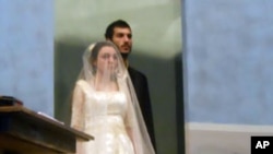 At the opening of the play a young Palestinian couple, played by Haroutioun Izmirilian and Samira al-Asir (front) stands in their home in Haifa, which is now an Israeli City.