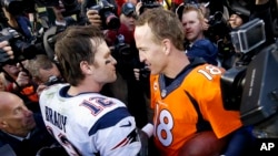 New England Patriots quarterback Tom Brady, left, and Denver Broncos quarterback Peyton Manning speak to one another following the NFL football AFC Championship game between the Denver Broncos and the New England Patriots, Jan. 24, 2016.