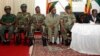 Members of the Zimbabwe Defence Forces, including police chief Augustine Chihuri, at State House after they staged a coup and put then President Robert Mugabe under house arrest. (AP Photo)