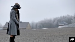King Willem-Alexander, behind, and Queen Maxima of the Netherlands have placed flowers at the memorial of former Nazi concentration camp Buchenwald, near Weimar, Germany, during their visit, Feb. 8, 2017.
