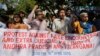 Activists shout slogans during a protest against two separate incidents of police killings on Tuesday in southern India, in New Delhi, India, Friday, April 10, 2015.