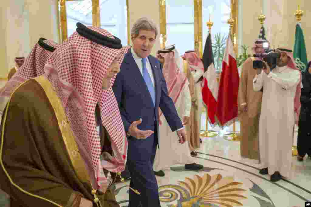 U.S. Secretary of State John Kerry speaks with Saud bin Faisal bin Abdulaziz al-Saud, Foreign Minister of Saudi Arabia, during a meeting of Gulf foreign ministers at Riyadh Air Base, March 5, 2015.