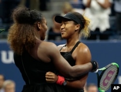 Serena Williams hugs Naomi Osaka, of Japan, after Osaka defeated Williams in the women's final of the U.S. Open tennis tournament, Saturday, Sept. 8, 2018, in New York.