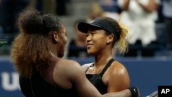 Serena Williams hugs Naomi Osaka, of Japan, after Osaka defeated Williams in the women's final of the U.S. Open tennis tournament, Saturday, Sept. 8, 2018, in New York.