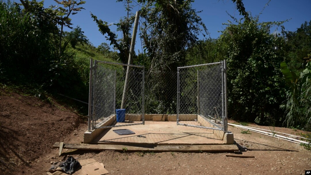 FILE - A view of an area prepared by residents for the installation of a pledged generator that never materialized, in Corozal, Puerto Rico, March 13, 2018. 