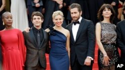 From left, Rokia Traore, Xavier Doran, Sienna Miller, Jake Gyllenhaal and Sophie Marceau arrive for the opening ceremony and the screening of the film 'La Tete Haute' at the 68th international film festival, Cannes, southern France, May 13, 2015. (Photo by Joel Ryan/Invision/AP)