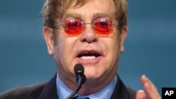Sir Elton John speaks at the International Aids Conference in Washington, July 23, 2012.