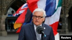 German Foreign Minister Frank-Walter Steinmeier gives a statement at Luebeck City Hall before a meeting of G7 foreign ministers, Luebeck, Germany, April 14, 2015.