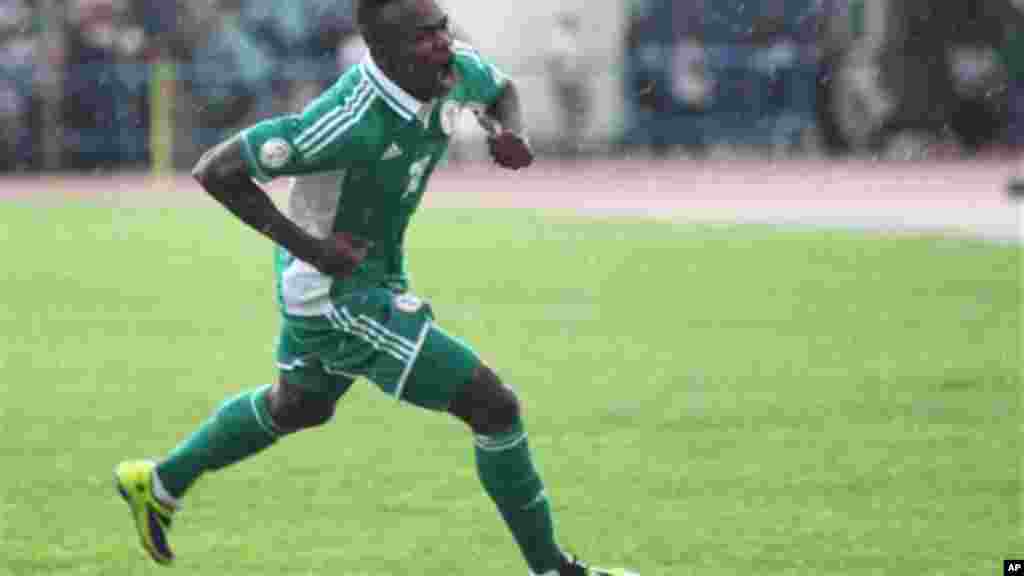 Nigeria&#39;s Nsofor Obinna Victor celebrates after he scored a goal against Ethiopia during their 2014 World Cup qualifying playoff match.