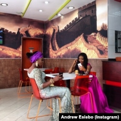 Andrew Esiebo: Two women and their cell phones in Lagos, Nigeria. @andrewesiebo from the book "Everyday Africa: 30 Photographers Re-Picturing a Continent"