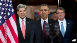 President Barack Obama, center, followed by Secretary of State John Kerry, left, and Defense Secretary Ash Carter right, walks to a podium to speak to media after a meeting of his National Security Council (NSC) at the State Department in Washington, Feb.