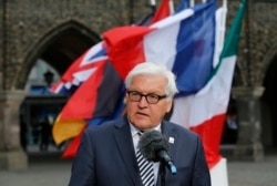FILE - Then-German Foreign Minister Frank-Walter Steinmeier gives a statement in Luebeck, Germany, April 14, 2015.