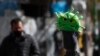 A street vendor sells new coronavirus puppets in La Paz, Bolivia, July 9, 2020.