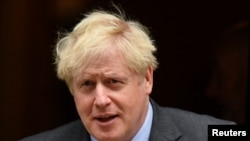 Britain's Prime Minister Boris Johnson leaves Downing Street, in London, Britain, September 22, 2020. 