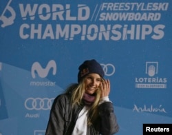 Gold medalist Anna Gasser of Austria reacts during the medal ceremony for Women's Big Air at the FIS Snowboarding and Freestyle Skiing World Championships, Sierra Nevada, Spain, March 17, 2017.