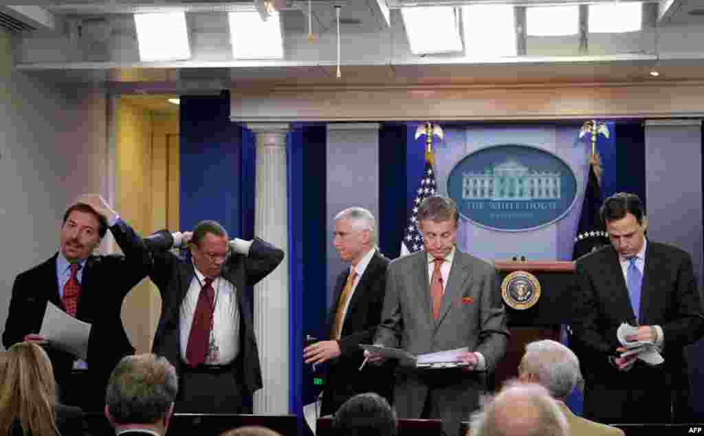 Moments before an appearance by President Obama, television correspondents prepare in the White House press room in Washington, Wednesday, April 27. for the president's remarks on the controversy over his birth certificate and true nationality. (AP Photo/