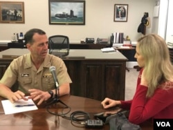 Admiral John Richardson and VOA reporter Carla Babb at the Pentagon.