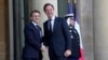 French President Emmanuel Macron, left, greets NATO Secretary General Mark Rutte as he arrives for an informal meeting of leaders from key European Union nations and the United Kingdom at the Elysee Palace in Paris, Feb. 17, 2025.