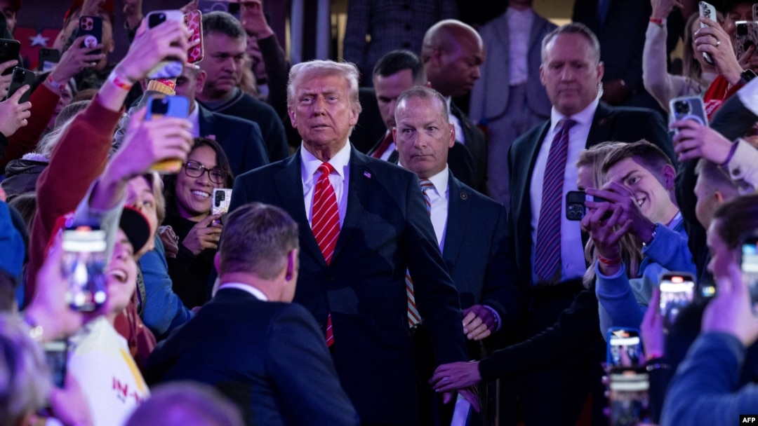 US President-elect Donald Trump arrives to speak at a MAGA victory rally at Capital One Arena in Washington, DC on January 19, 2025, one day ahead of his inauguration ceremony. (Photo by Jim WATSON / AFP)