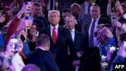 US President-elect Donald Trump arrives to speak at a MAGA victory rally at Capital One Arena in Washington, DC on January 19, 2025, one day ahead of his inauguration ceremony. (Photo by Jim WATSON / AFP)