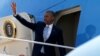 FILE - President Barack Obama boards Air Force One.