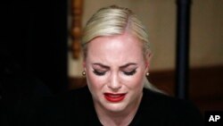 FILE - Meghan McCain, daughter of, Sen. John McCain, R-Ariz. cries during a memorial service at the Arizona Capitol on Wednesday, Aug. 29, 2018, in Phoenix.