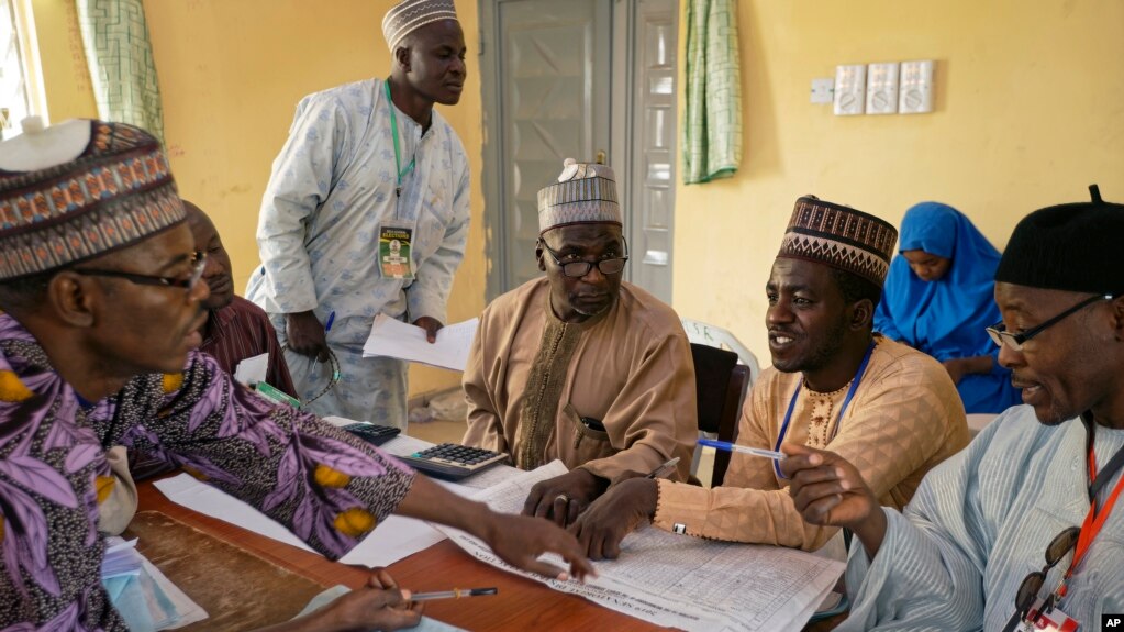 Electoral officials compile voting results at a collation center in Kano, northern Nigeria, Feb. 24, 2019.