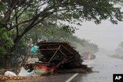 Street shops are seen collapsed because of gusty winds ahead of the landfall of Cyclone Fani on the outskirts of Puri, in the Indian state of Odisha, May 3, 2019. Indian authorities have evacuated hundreds of thousands of people ahead the cyclone.
