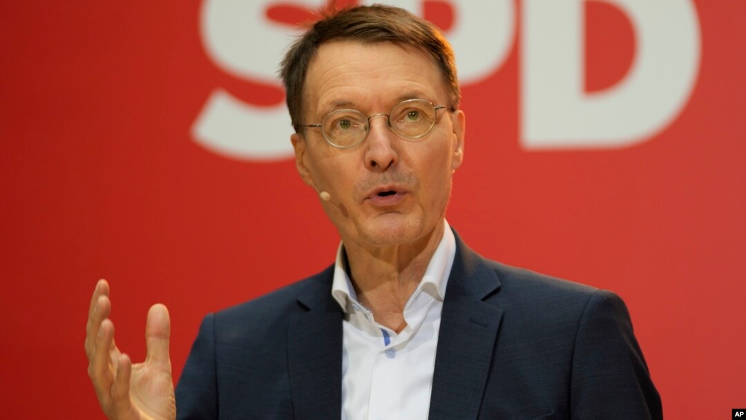 Designated new German Health Minister Karl Lauterbach of the Social Democratic Party, SPD, speaks during a news conference at the party's headquarters in Berlin, Dec. 6, 2021. 