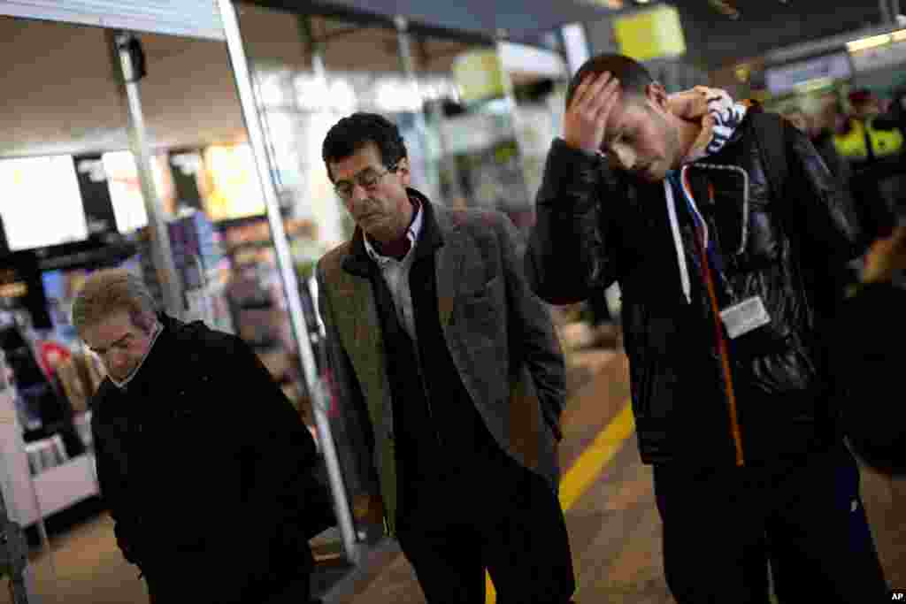 Relatives of victims of the Germanwings plane crash arrive at the Barcelona Airport, in Spain, March 24, 2015.