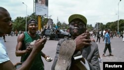 En images : violences à Kinshasa lors de la manifestation anti-Kabila