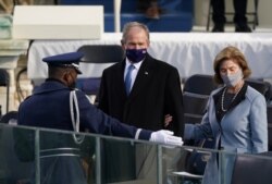 Former U.S. President George W. Bush and his wife Laura Bush arrive for the inauguration of Joe Biden as the 46th President of the United States on the West Front of the U.S. Capitol in Washington, U.S., January 20, 2021. (REUTERS/Kevin Lamarque)