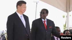 UMnu. Xi Jinping loMongameli Mugabe. 