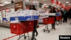 Shoppers take advantage of Black Friday sales at a Target store in the Brooklyn borough of New York City, Nov. 25, 2016. 