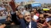 Presidential hopeful Hamdeen Sabahi greets supporters after Friday prayers, Baltim, Egypt, May 16, 2014.