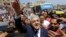 Presidential hopeful Hamdeen Sabahi greets supporters after Friday prayers, Baltim, Egypt, May 16, 2014.