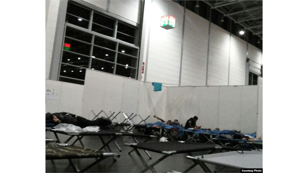 The German government has provided cots and space for refugees as thousands pour in. Refugees now in Germany say they fear the crowds coming in will make it impossible to sustain livable conditions. Courtesy photo from refugee in Germany, Sept. 19, 2015.
