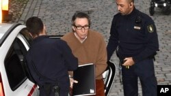 FILE - Frenchman Jean-Claude Arnault arrives at the Svea Hovratt appeal court on the third day of his appeal on Wednesday Nov. 14, 2018, in Stockholm, Sweden.